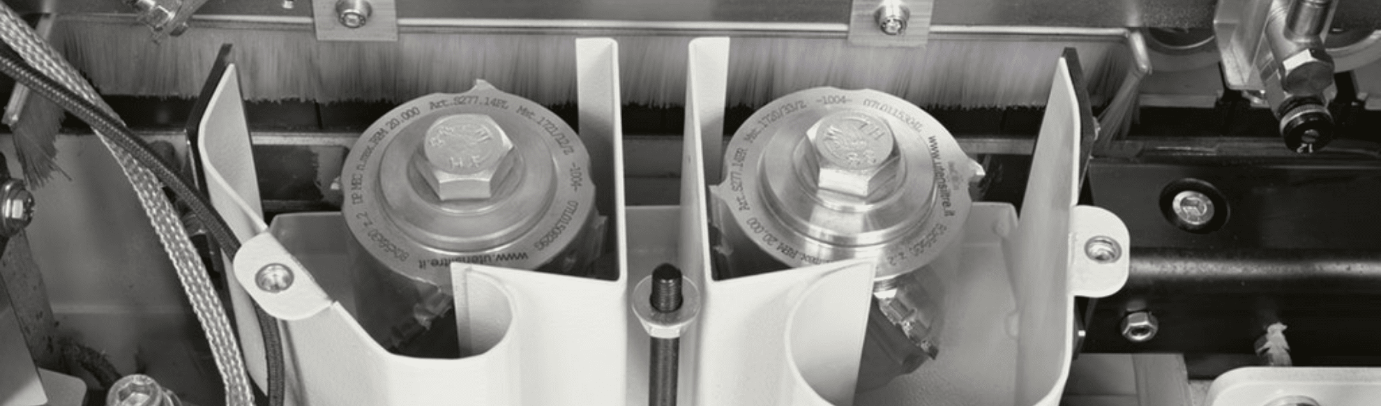 A black and white image of internal edgebander hardware